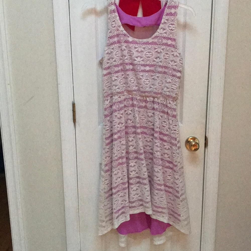 White and purple high low dress.